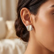 Ivory Ribbon Studs — 2